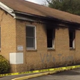 The side of the Hopewell Missionary Baptist Church shows a badly burned part of the building, as well as the words “Vote Trump” spray-painted on the building’s side.
Angie Quezada via Facebook